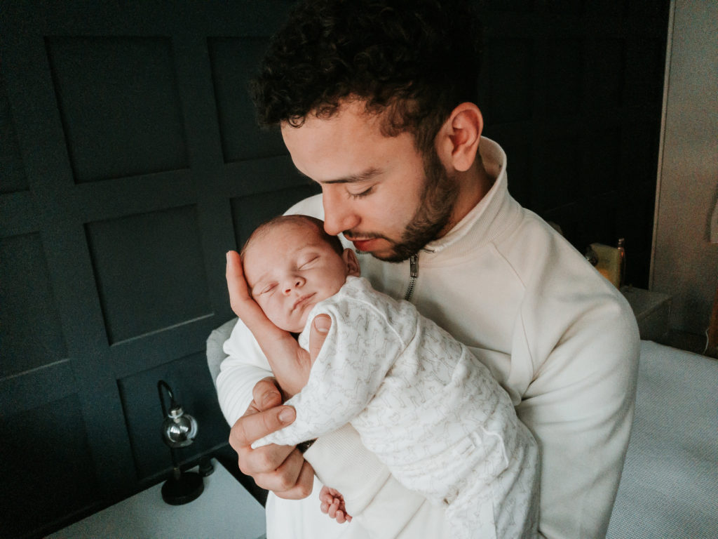 virtual newborn shoot dad holding baby